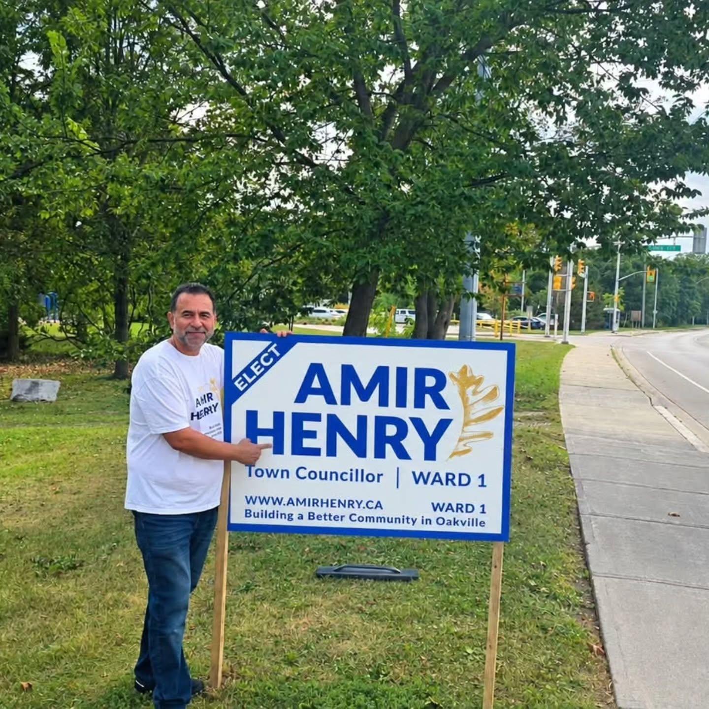 Amir Henry with his Ward 1 campaign lawn sign