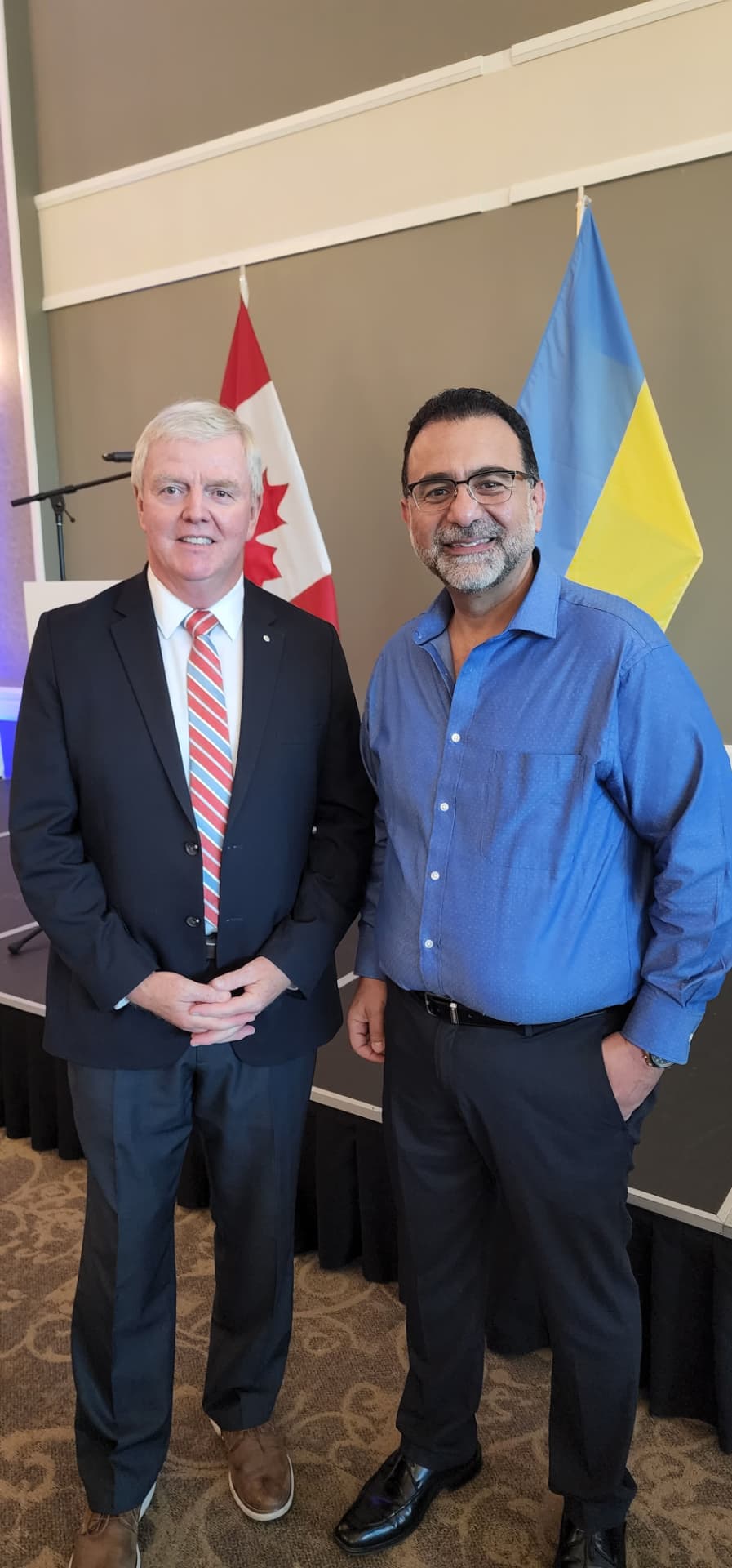 Amir Henry with the federal party leader at a community event
