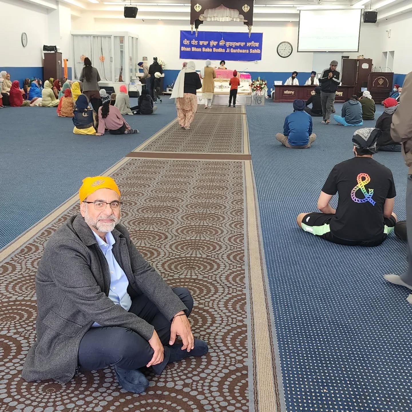 Amir Henry attending prayers at Dhan Dhan Baba Budha Ji Gurdwara Sahib
