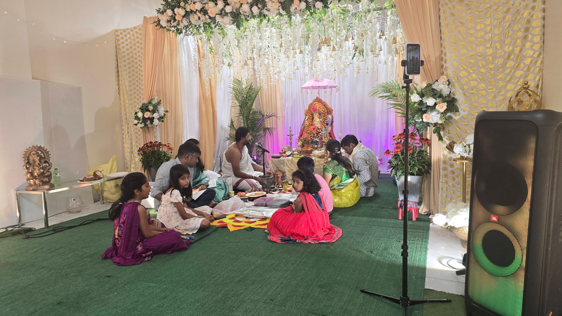 Amir Henry at a Hindu temple celebration with community members
