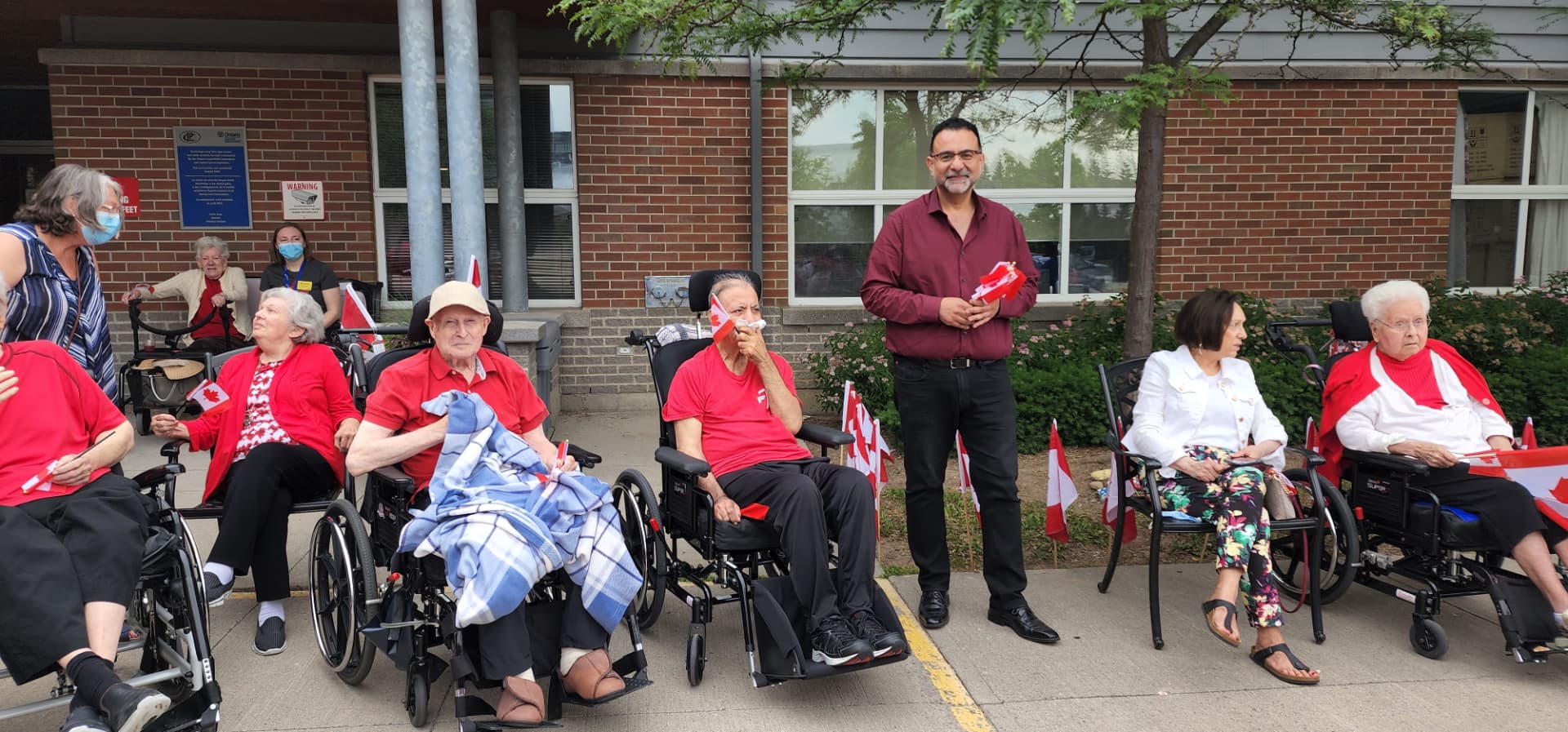 Amir Henry celebrating Canada Day with residents