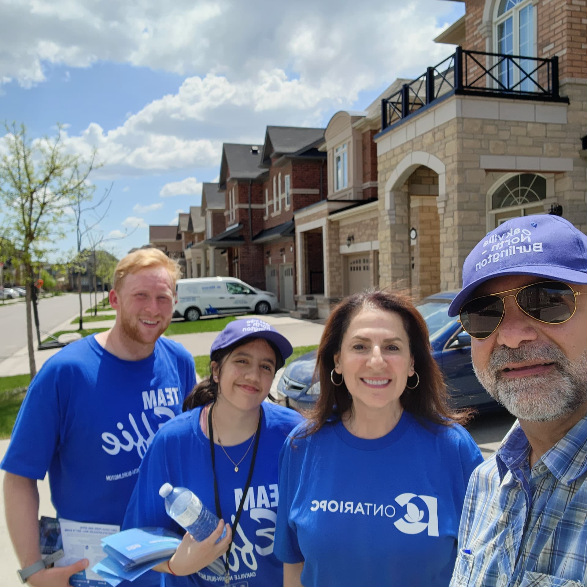 Amir Henry door-to-door with campaign volunteers